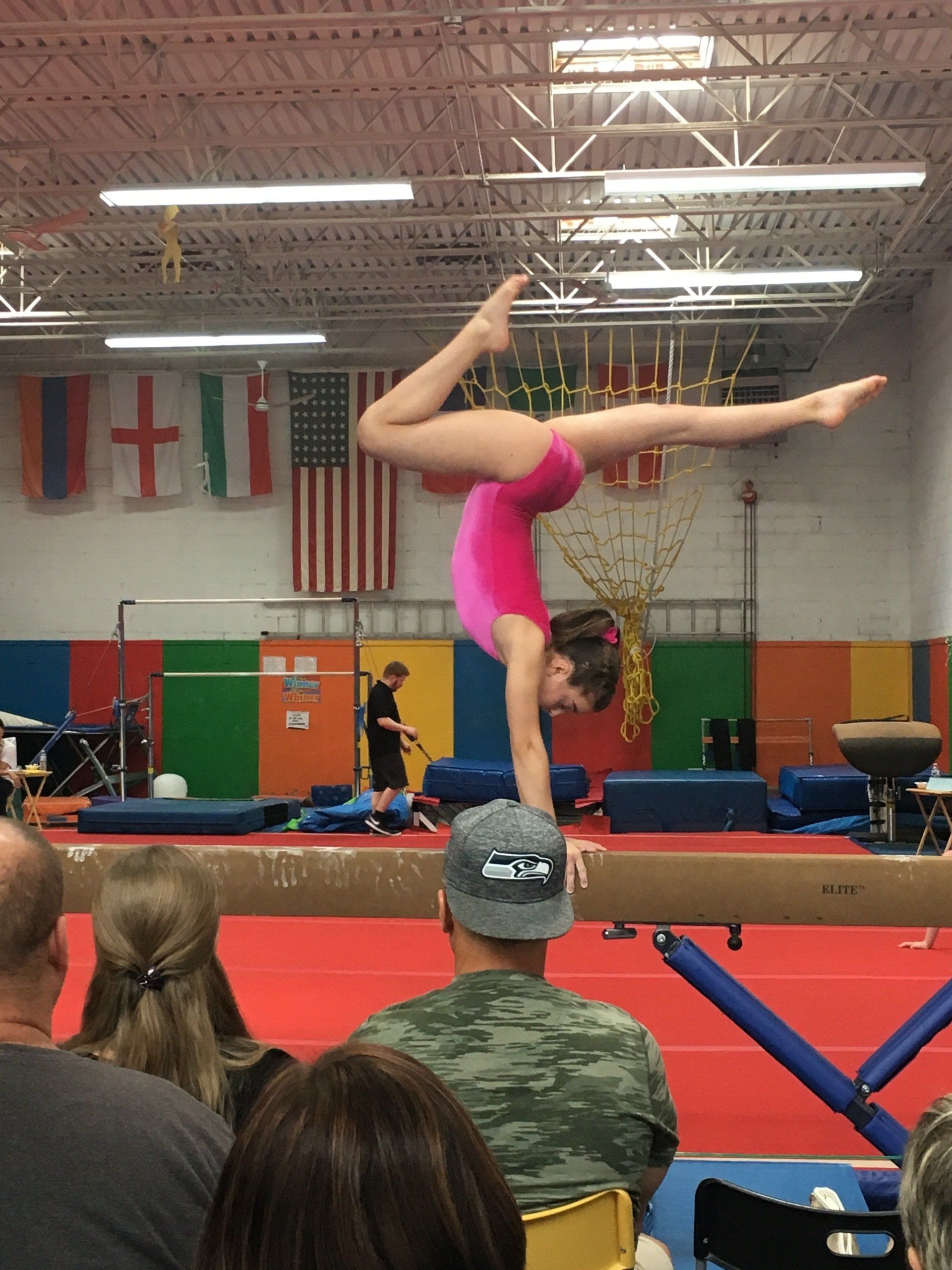 Gymnast landing a dismount
