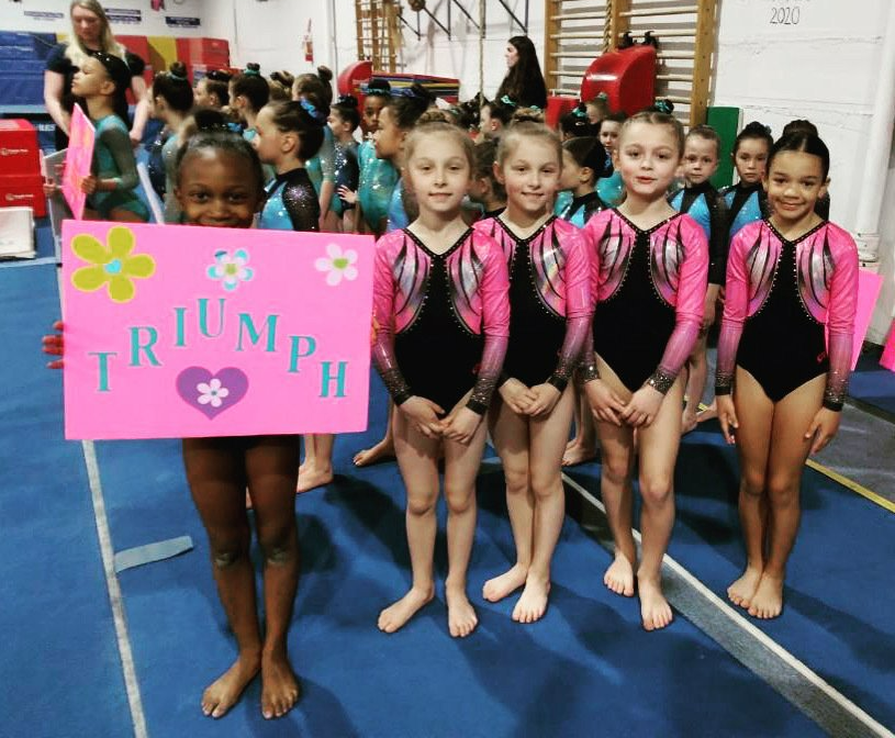 Team practicing floor routine