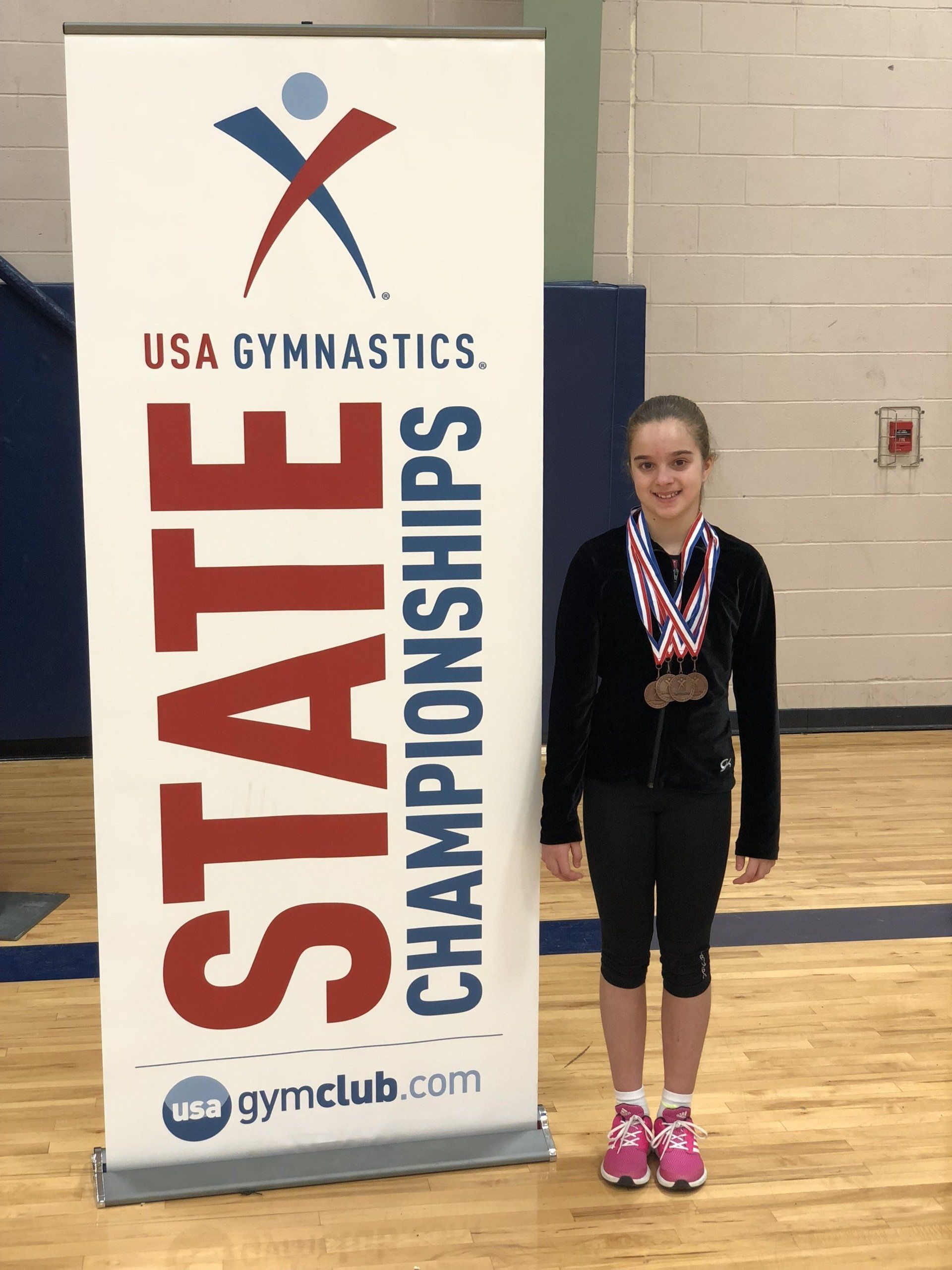Young athlete on the rings