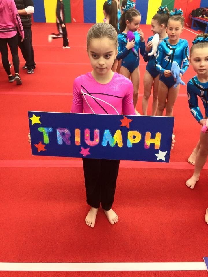 Gymnast training on the uneven bars